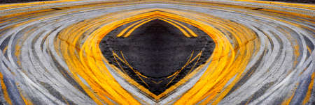 Road with painted yellow lines and big curve or turnの写真素材