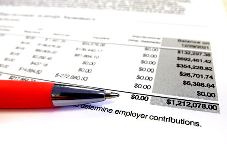 Financial report with red pen showing millionaire investments successful investingの写真素材