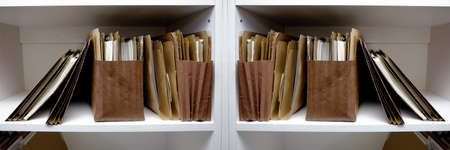 Business files in boxes folders and shelf papersの写真素材