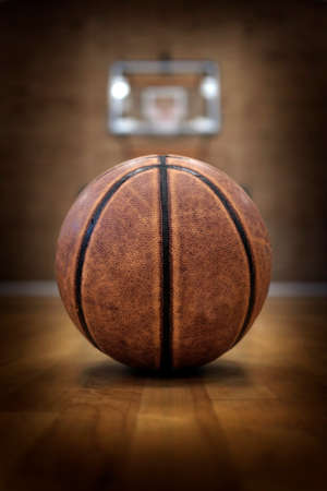 Basketball court with ball hoops rims hardwood floor and lights for competition gameの写真素材