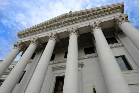 Columns of marble on a building pavilion showing architecture design and decorative structure with light and shadowsの写真素材