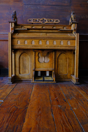 Old organ musicl instrument carved from wood in mission churchの写真素材