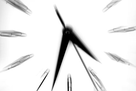 Clock showing time speeding away motion movementの写真素材