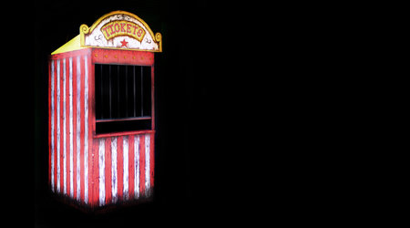 Old ticket booth at a carnival or circus selling ticket for rides and funの写真素材