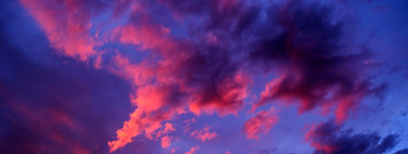 Amazing Colorful sunset or sunrise sky with orange pink purple and blue dramaticの写真素材