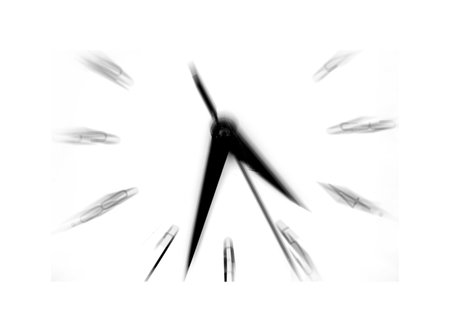 Clock showing time speeding away motion movementの写真素材