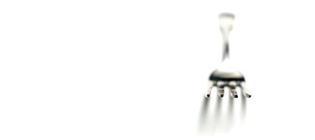 Single Fork Isolated on White Background with selective focus for dining and eating fancy food elegantの写真素材