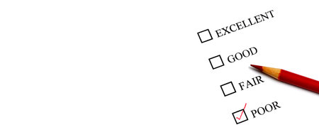Checklist of Options from Excellent to Poor on survey form with red pencil used for business successの写真素材