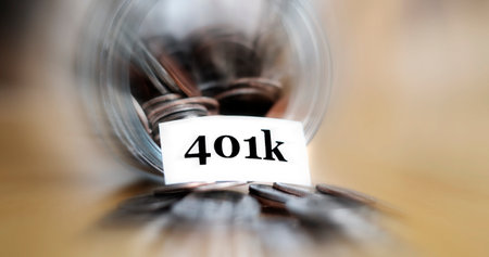 Money jar for savings and investment IRA 401k retirement or college rainy dayの写真素材