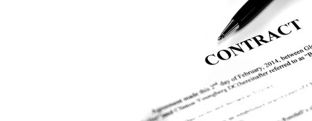 Written contract on pape with black pen for big business dealの写真素材