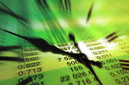 Detail of clock face with numbers and hands showing time with money in background zoom motion for speed of business and earningsの写真素材