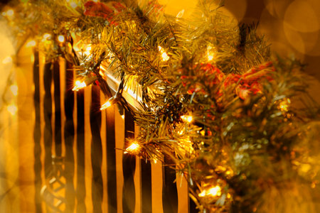 Christmas decorations and glowing warm lights red and green celebrationの写真素材