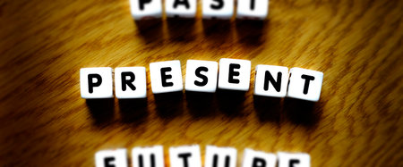 Past present and future words spelled out for planning ahead and learning to progressの写真素材