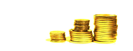 Pile of old gold coins stacked up representing wealth and riches successの写真素材