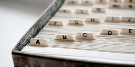 Closeup of index cards with alphabet letters for business school or home organization organize names informationの写真素材