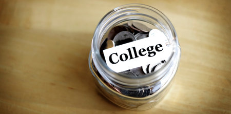 Money jar for savings and investment IRA 401k retirement or college rainy dayの写真素材