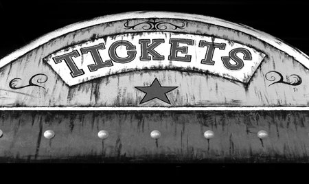 Old ticket booth at a carnival or circus selling ticket for rides and funの写真素材
