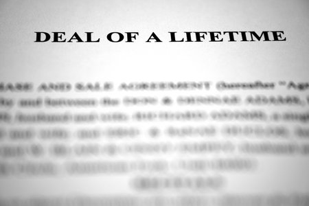 Deal of a lifetime on document for opportunity in business or investingの写真素材
