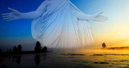 Morning sunrise with trees and river under blue sky and glowing mist with Jesus as the Creatorの写真素材