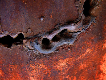 Weld seam on old plate metal with texture and rustの写真素材