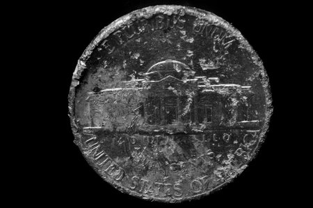 Texture of old rough worn US Nickel coin money silver