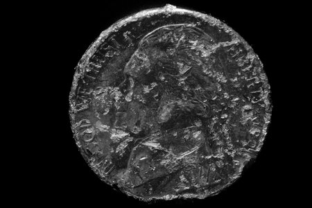 Texture of old rough worn US Nickel coin money silverの写真素材
