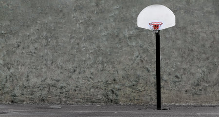 Urban basketball hoop in concrete playground textures grungy