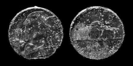 Texture of old rough worn US Nickel coin money silverの写真素材