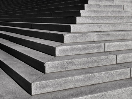 Concrete steps on a building with shadow and shape stairs