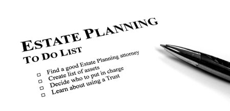 Written Estate Planning to do list on desk with penの写真素材