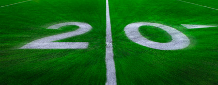 Football field green grass white yard markers to touchdown competition gameの写真素材
