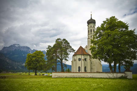 A church at the foot of the Alpsの写真素材