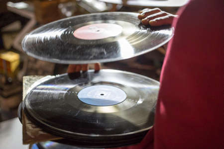 black guy hands holding vinyl discsの写真素材