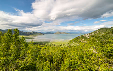 skadarsko jezero, skadar lake panoramic view wide angle, trees mountainsの写真素材