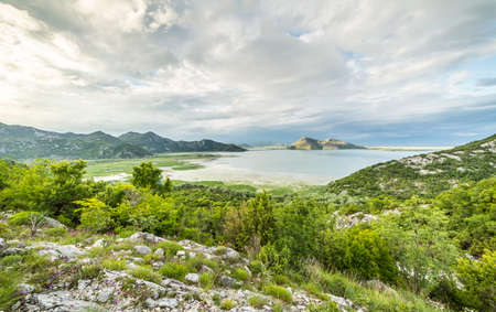 skadarsko jezero, skadar lake panoramic view wide angle, trees mountainsの写真素材