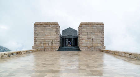 A panoramic shot of the entrance to a historical stone monument