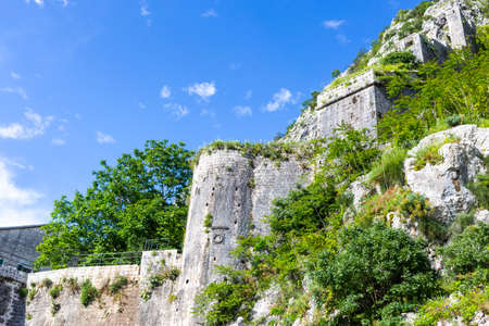 kotor fortress ruins church stones with mountain landscapeの写真素材