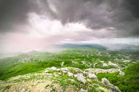 cloudy mountains epic landscape valley on Lovcen mountainの写真素材