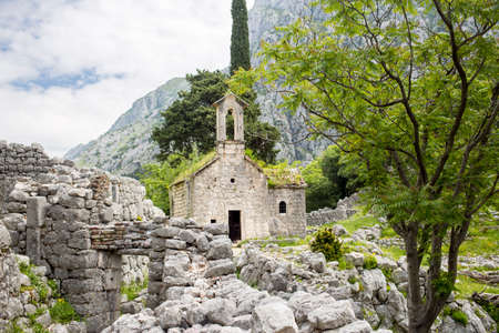 kotor fortress ruins church stones with mountain landscapeの写真素材