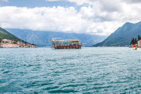 kotor bay speedboat cruise view, sea and rocky hills