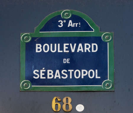 typical parisian street name signs famousの写真素材