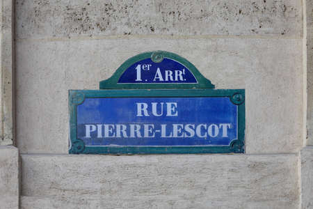 typical parisian street name signs famous