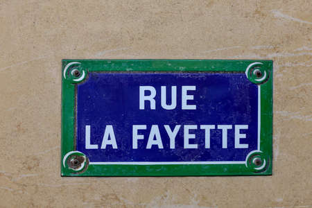 typical parisian street name signの写真素材
