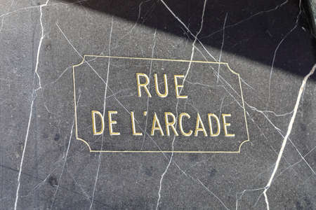 typical parisian street name sign