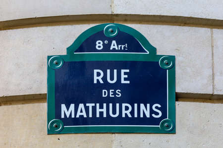 typical parisian street name signの写真素材