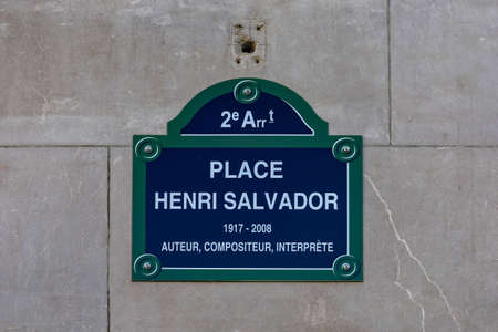 typical parisian street name signの写真素材