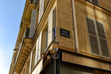 typical parisian street name signの写真素材