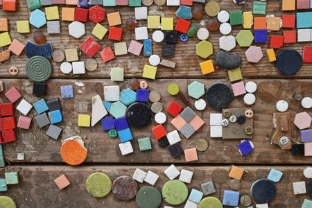 Colorful wooden buttons background. Top view, copy space for text