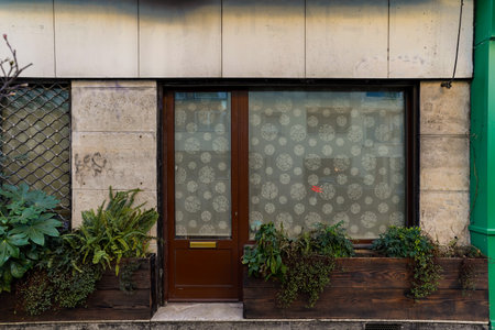 The front door of a building in the city of Barcelona, Spainの写真素材
