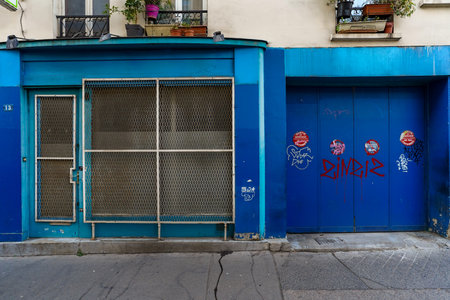 old blue door of shop in the streetの写真素材